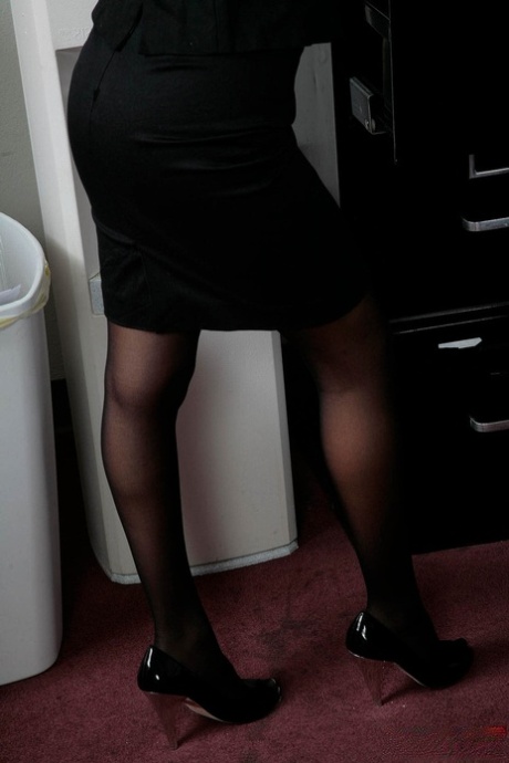 seducción de secretaria sexo erótico foto